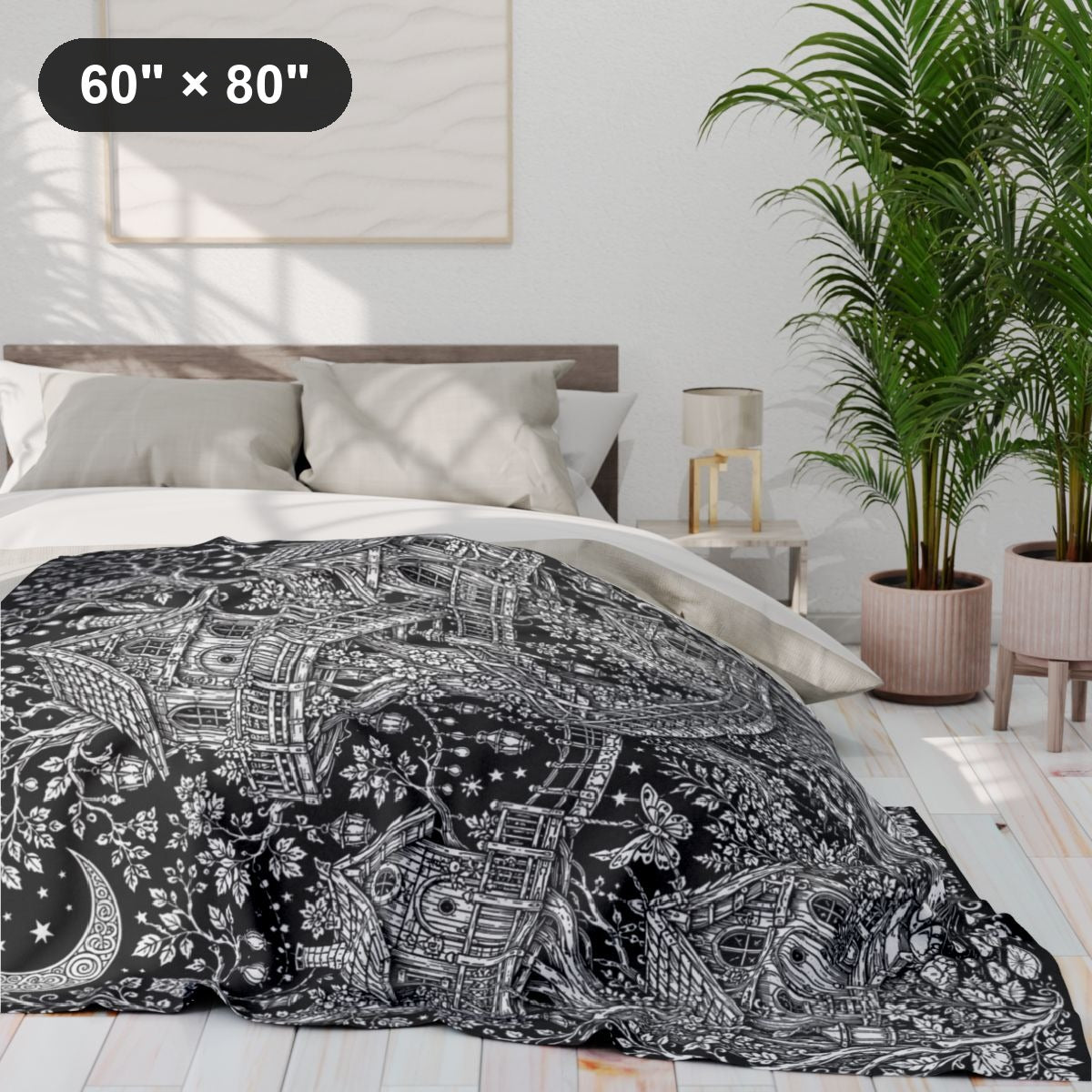 Moonlit Fairy Treehouse Village Fleece Blanket kit shown in a lifestyle mockup - 60" × 80"