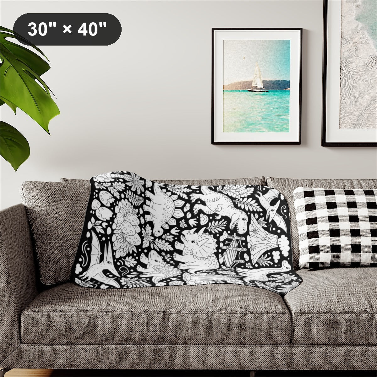 Dinosaur Jungle Sherpa Blanket kit shown in a lifestyle mockup - styled in a living room - 30" × 40"
