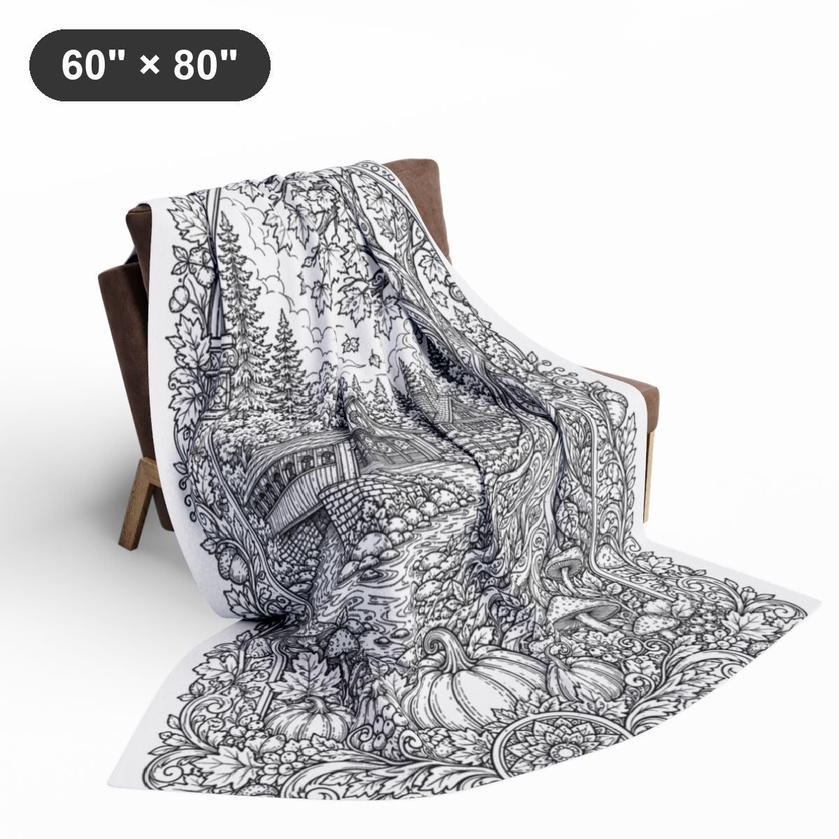 Autumn Covered Bridge Fleece Blanket coloring kit shown in a lifestyle mockup - styled in a living room - 60" × 80"