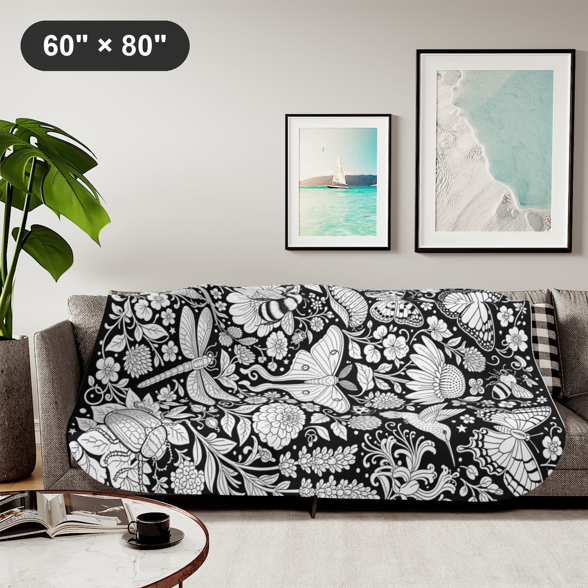 Butterfly and Moth Garden Sherpa Blanket kit shown in a lifestyle mockup - styled in a living room - 60" × 80"