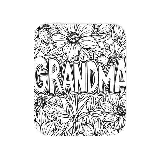 Blanket featuring a grandma coloring page design with large flowers and the word 'GRANDMA' amidst the pattern, perfect for grandmothers, grannies, or moms-to-be who love a personalized blanket for themselves or as a gift