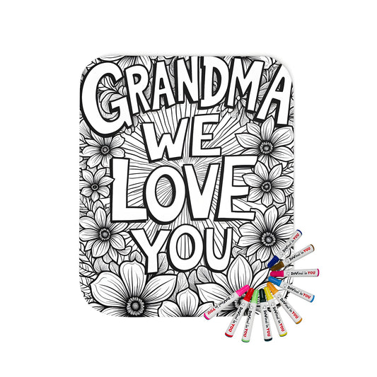 A cozy blanket with a vintage grandma-themed design featuring a detailed black and white coloring page with 'Grandma We Love You' text surrounded by flowers.