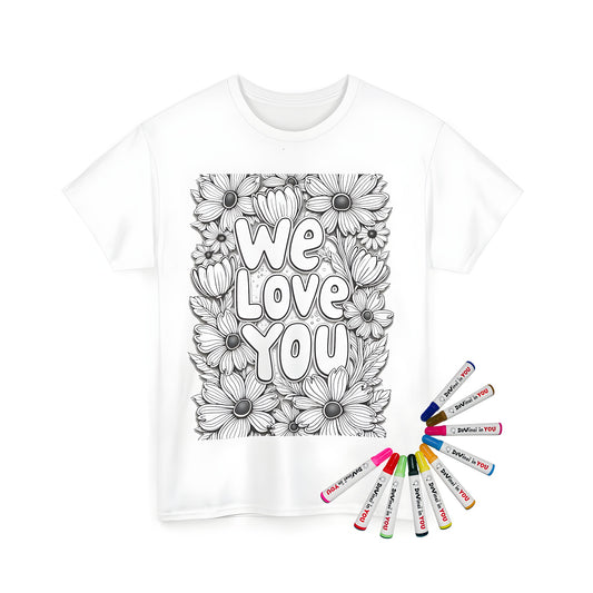 Unisex T-shirt featuring a grayscale coloring page design with 'We Love You' text and framed by detailed floral illustrations of daisy blooms