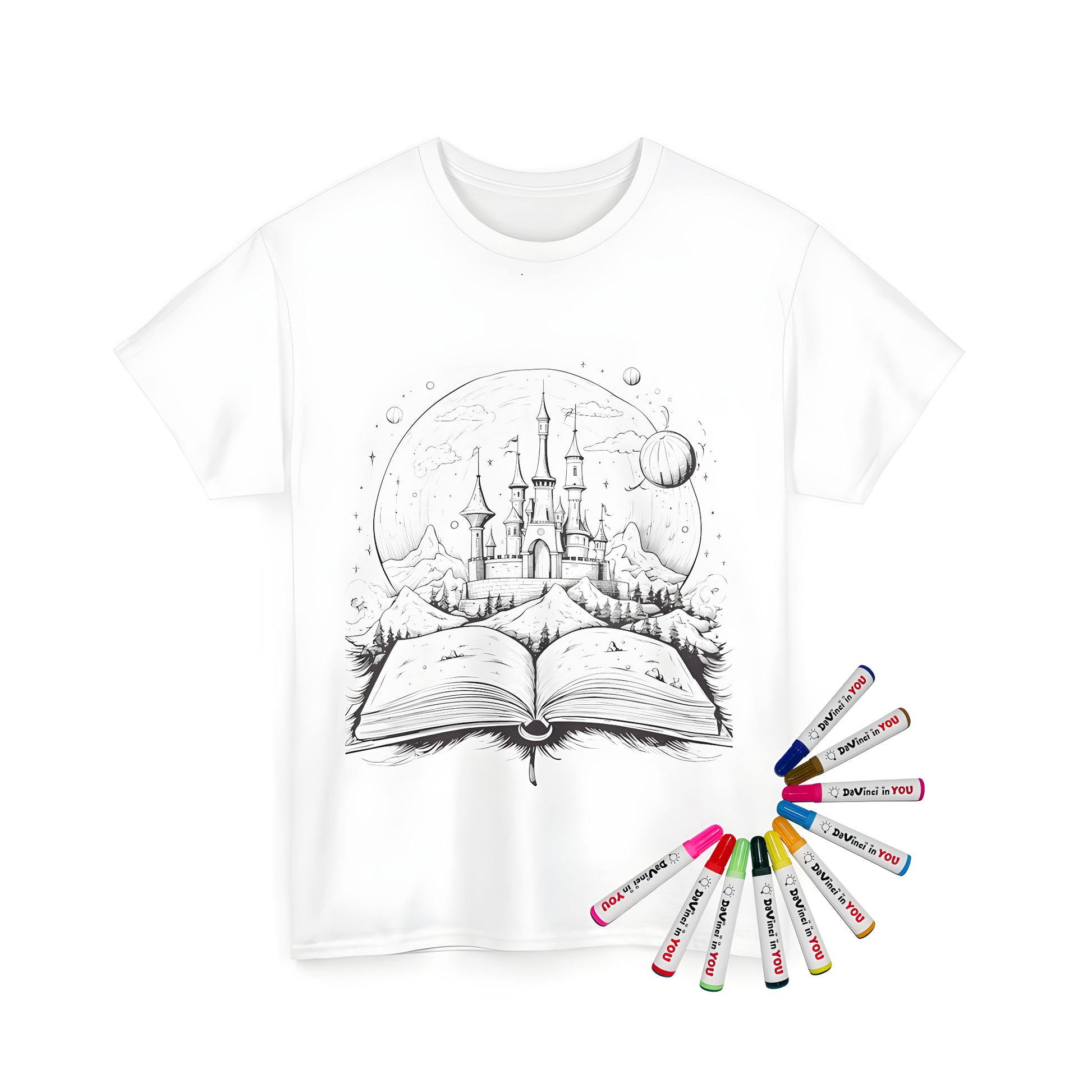 A coloring kit for adults featuring an intricate fantasy illustration of a castle rising from an open storybook, surrounded by mountains, planets, and clouds, printed on a unisex t-shirt