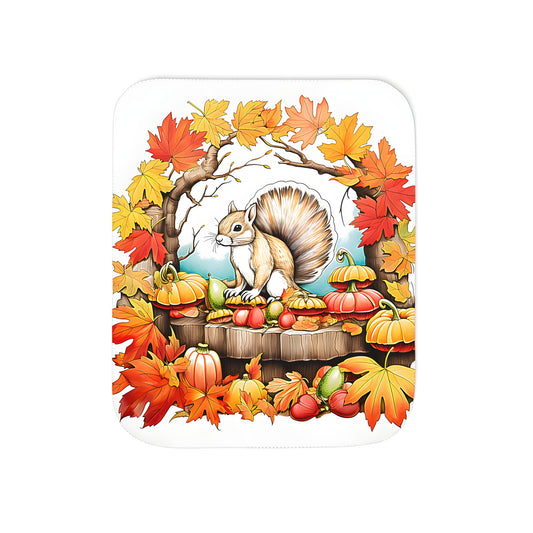 Cozy blanket with colorful squirrel in autumn leaves design, perfect for fall decor