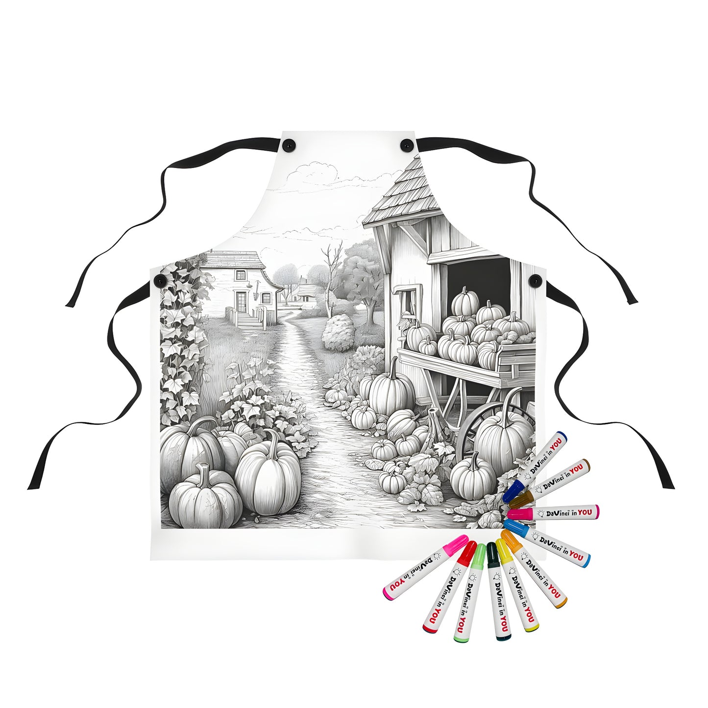 Apron with colorful countryside scene print featuring path to houses, pumpkins, trees, and barn