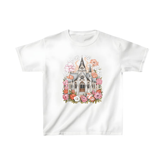 A vibrant illustration of a church surrounded by colorful flowers on a kid's t-shirt