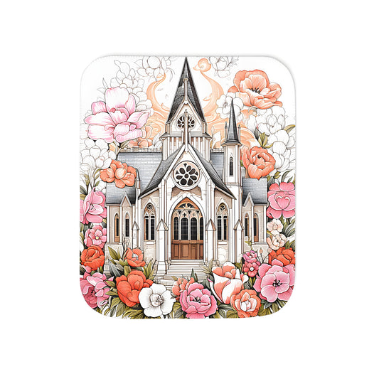 Blanket with colorful illustration of Gothic church surrounded by blooming flowers