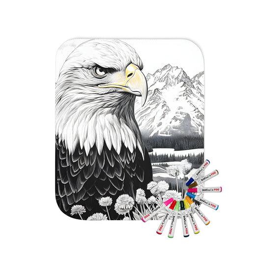 Coloring blanket featuring a detailed black and white drawing of an American eagle or hawk, set against a scenic landscape of mountains and wildflowers.