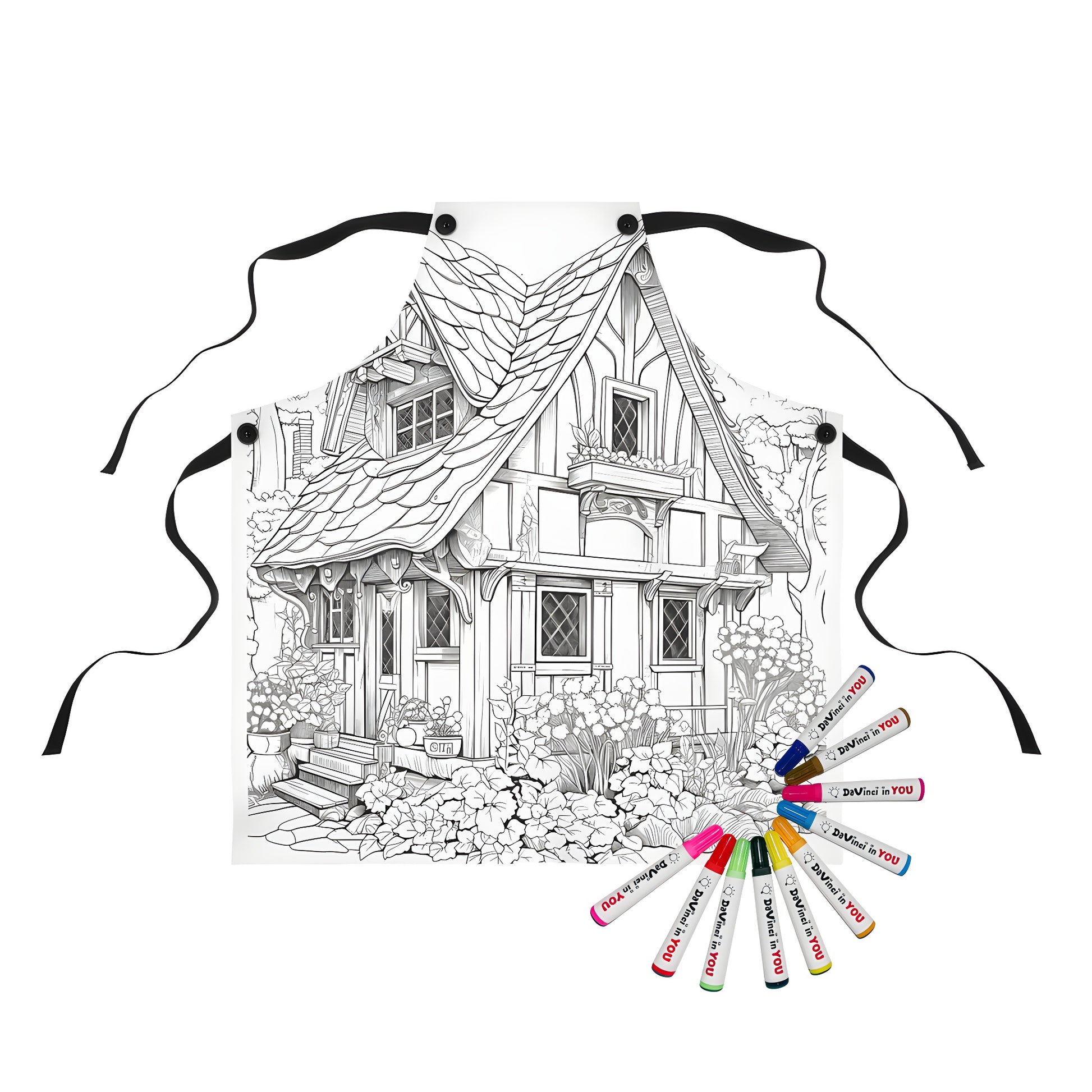 Apron featuring a charming black and white cottage scene with detailed plants and flowers, perfect for a cottagecore enthusiast or crafty adult looking for a unique gift. Includes 10 fabric markers for creative coloring