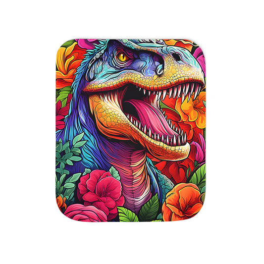 A plush blanket featuring a vibrant illustration of a T-Rex head surrounded by colorful flowers and lush green leaves