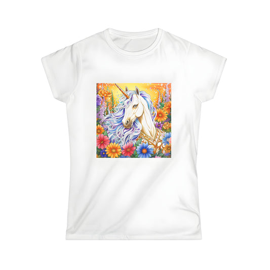 Women's t-shirt featuring an enchanting unicorn illustration in a lush flower garden under a warm golden sky.