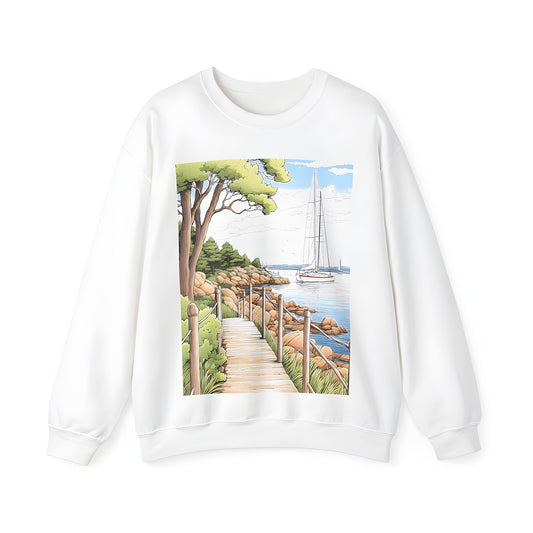 Adult sweatshirt with tranquil coastal landscape design featuring wooden path, greenery, rocky shore, calm ocean waters and sailboats