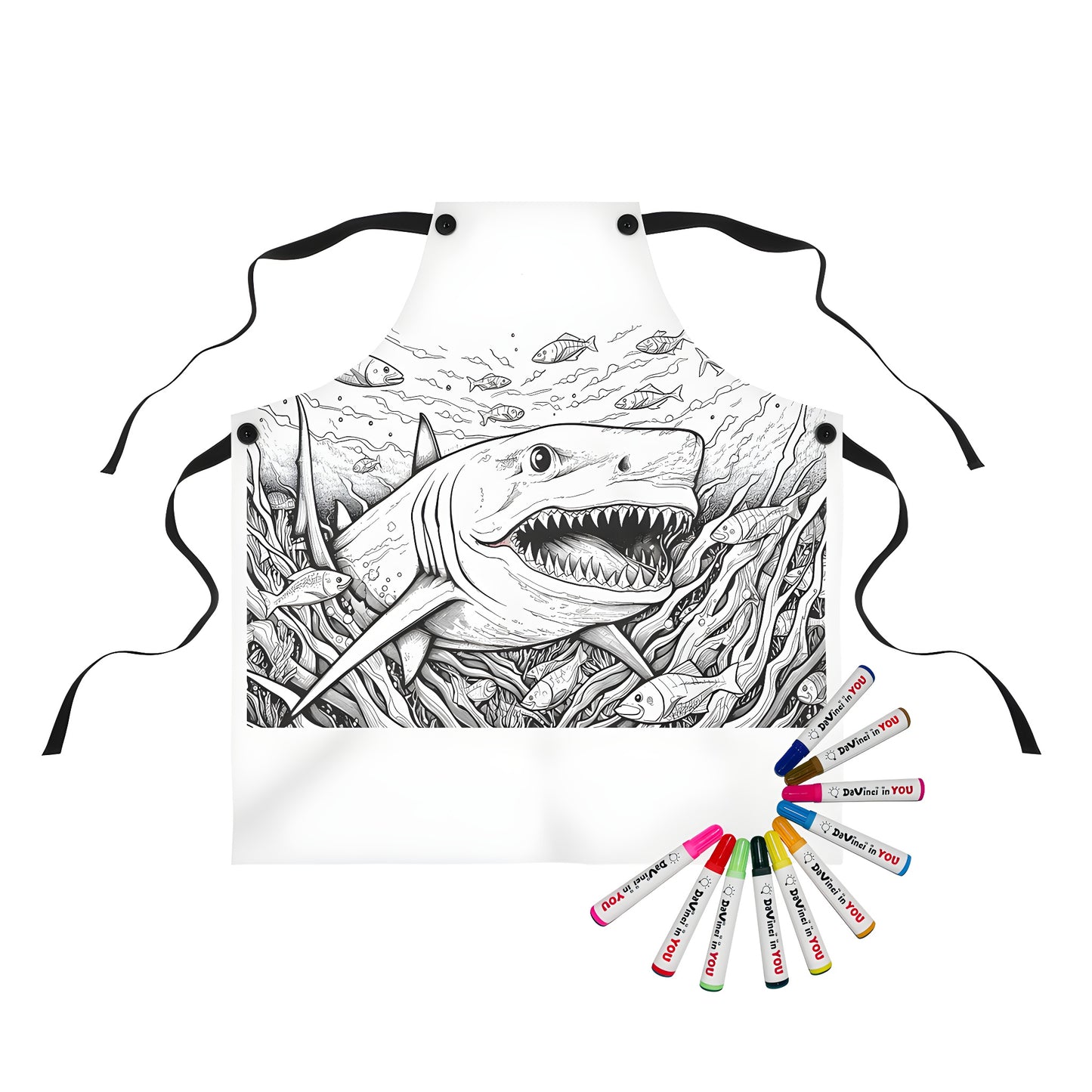 Coloring kit apron featuring a detailed underwater scene of a shark with its mouth wide open, surrounded by fish and seaweed. Great for kids who love ocean creatures!