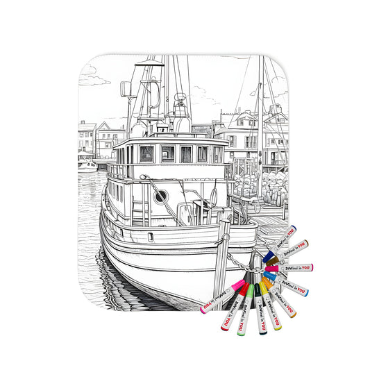 A colorful blanket featuring a detailed line drawing of a boat docked at a seaside harbor