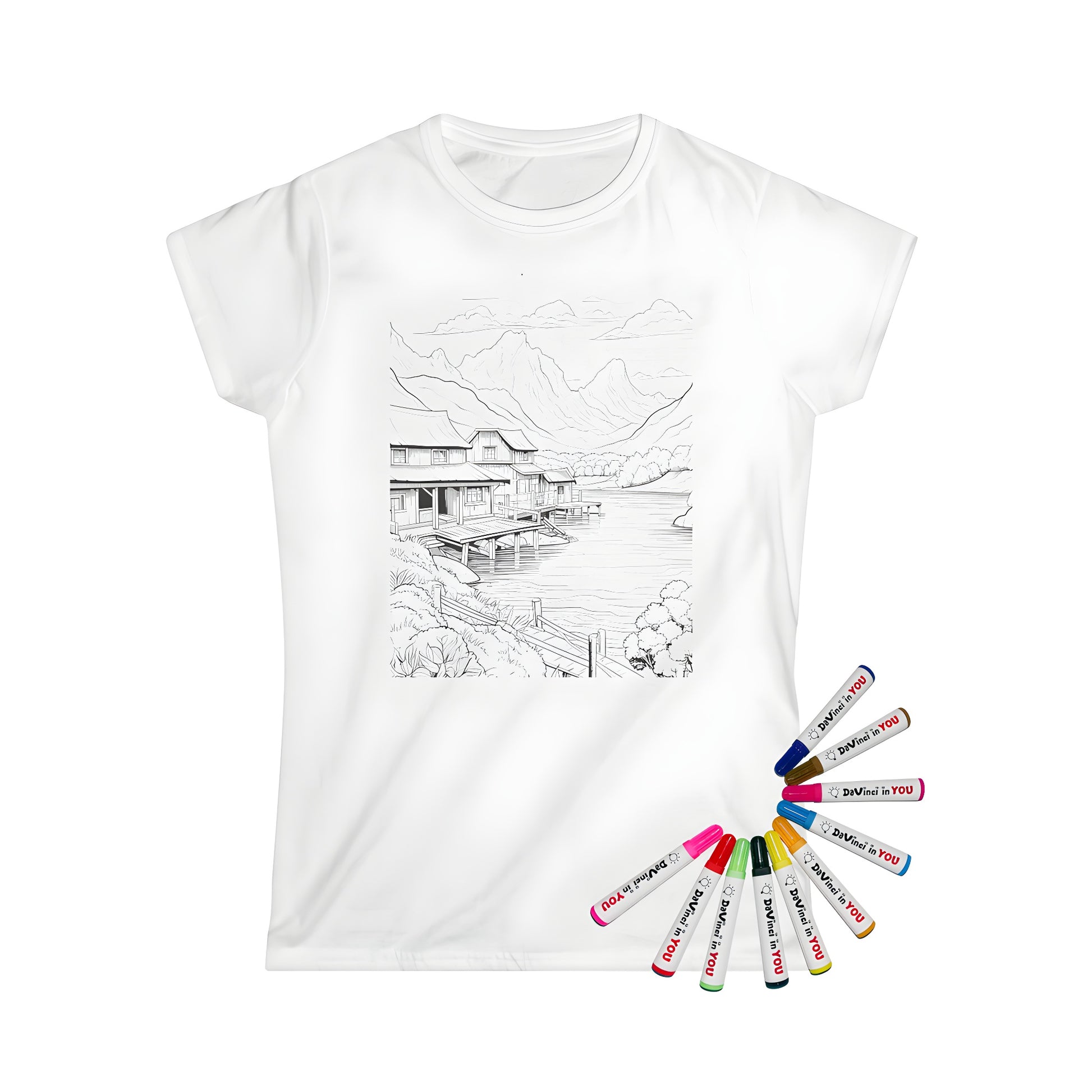 Women's t-shirt featuring a serene village landscape art, mountains and lakes