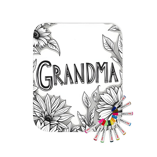 Colorful blanket featuring a beautiful black and white sunflower illustration surrounded by vibrant flowers, perfect for gifting Grandma or loved ones, created with fabric markers