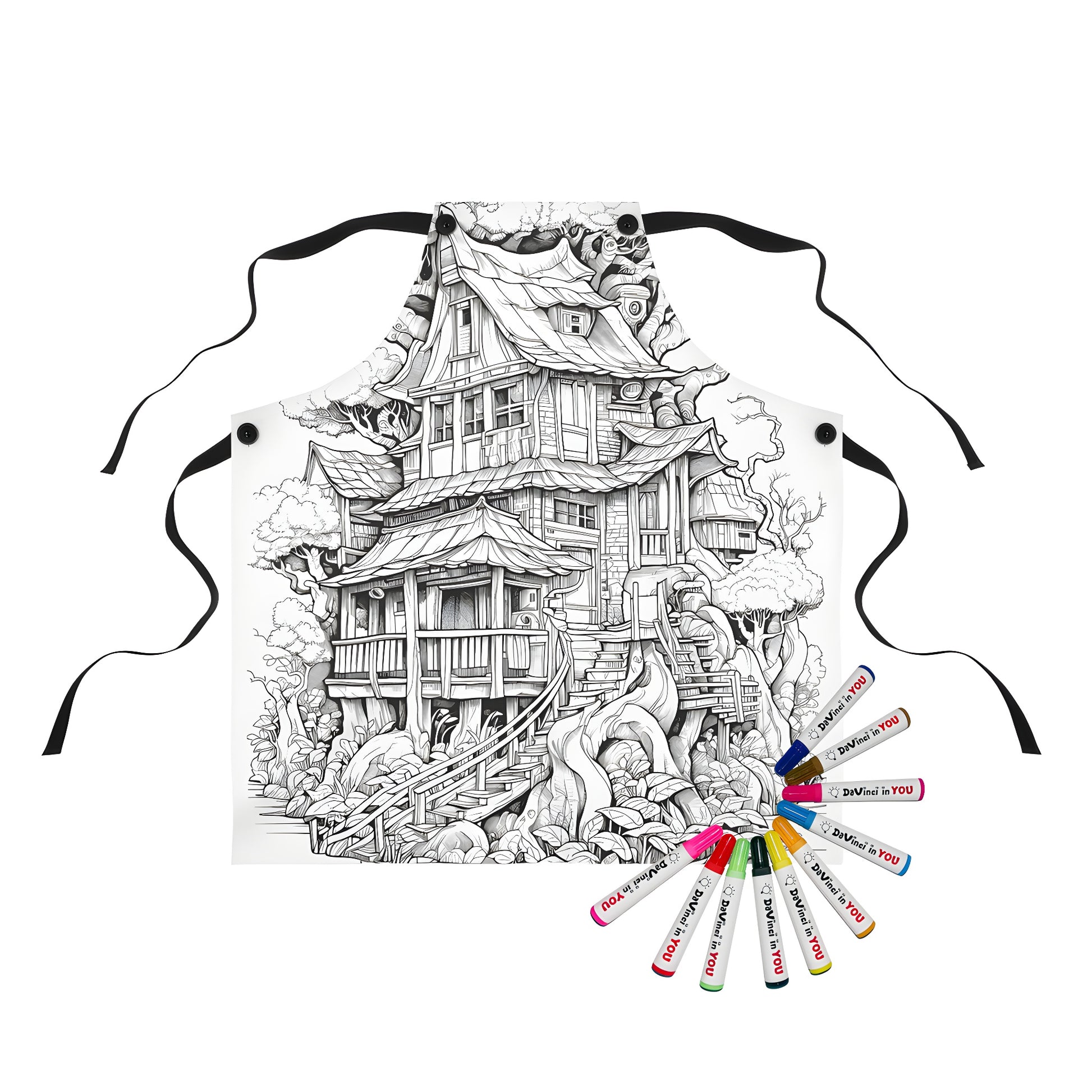 Aprons with whimsical tree house designs and vibrant fabric markers for creative coloring