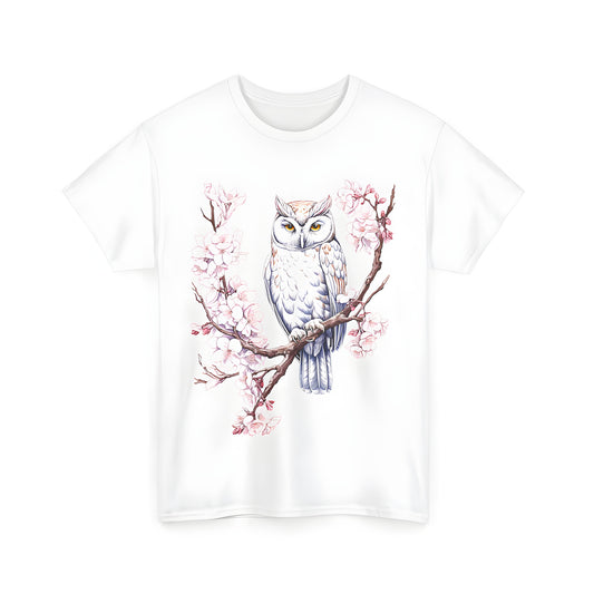 Colorful graphic of an owl perched on a branch with blossoms, printed on a comfortable unisex t-shirt. Illustration of a bird on a blooming branch, perfect for fans of nature and wildlife.