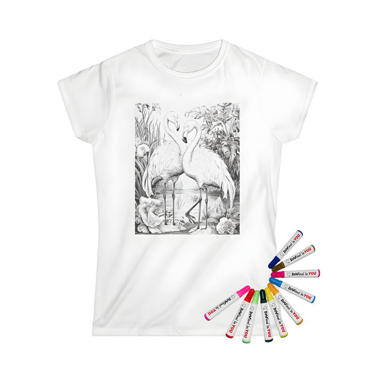 Woman wearing a colorful t-shirt with a beautiful flamingo or pink bird illustration of two birds standing in a pond surrounded by lush foliage and flowers