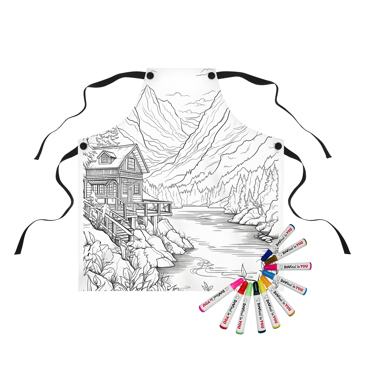 Coloring apron featuring a detailed line drawing of a cabin by a lake surrounded by mountains and trees