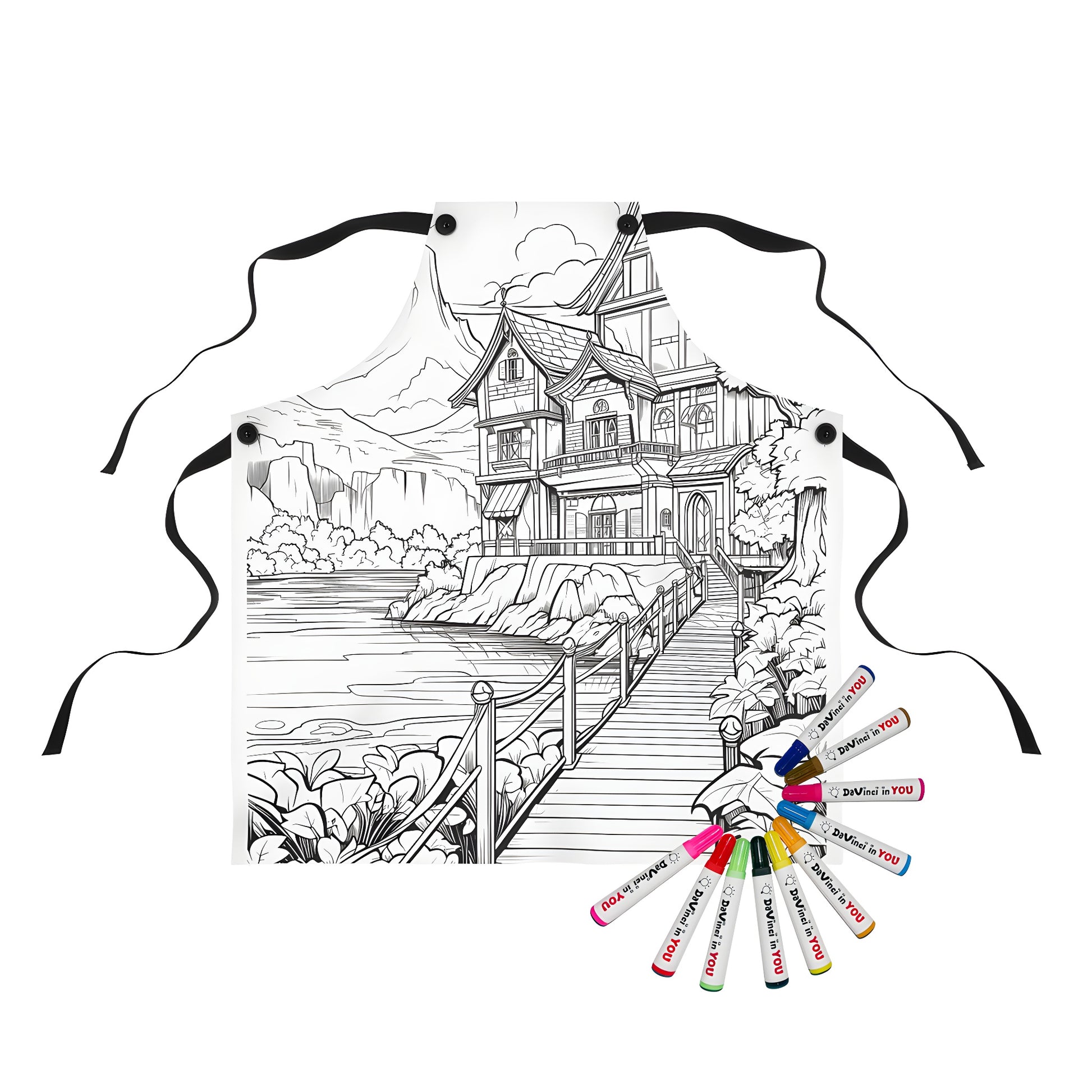 Coloring kit apron featuring a detailed countryside house scene by a serene lake with majestic mountains and lush greenery