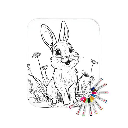 A colorful blanket featuring a cute bunny illustration in a garden scene