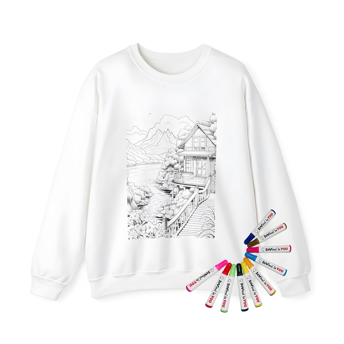 Adult sweatshirt featuring a unique, hand-drawn mountain landscape design with a charming house, serene river, lush trees, vibrant flowers, and a rustic wooden bridge. A creative, artistic, and peaceful print for any nature lover or adventure enthusiast.