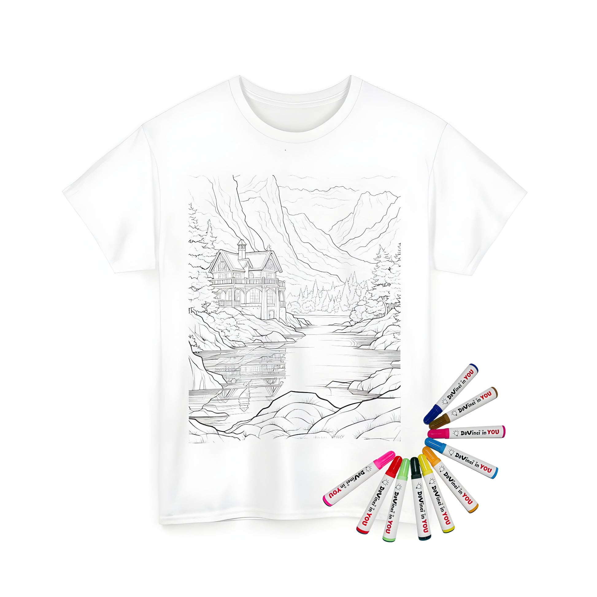 Unisex t-shirt featuring a detailed cabin design near a serene lake, surrounded by mountains and lush trees, perfect for coloring with fabric markers