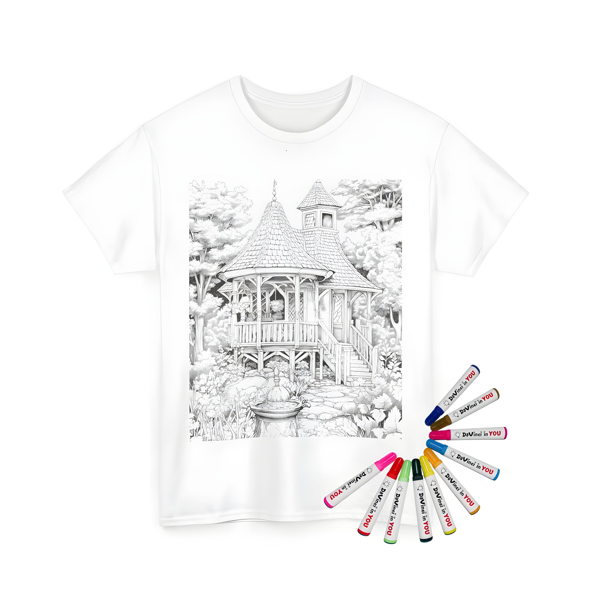 Unisex t-shirt featuring a detailed black and white drawing of a cozy cottage scene with steps, trees, and a fountain