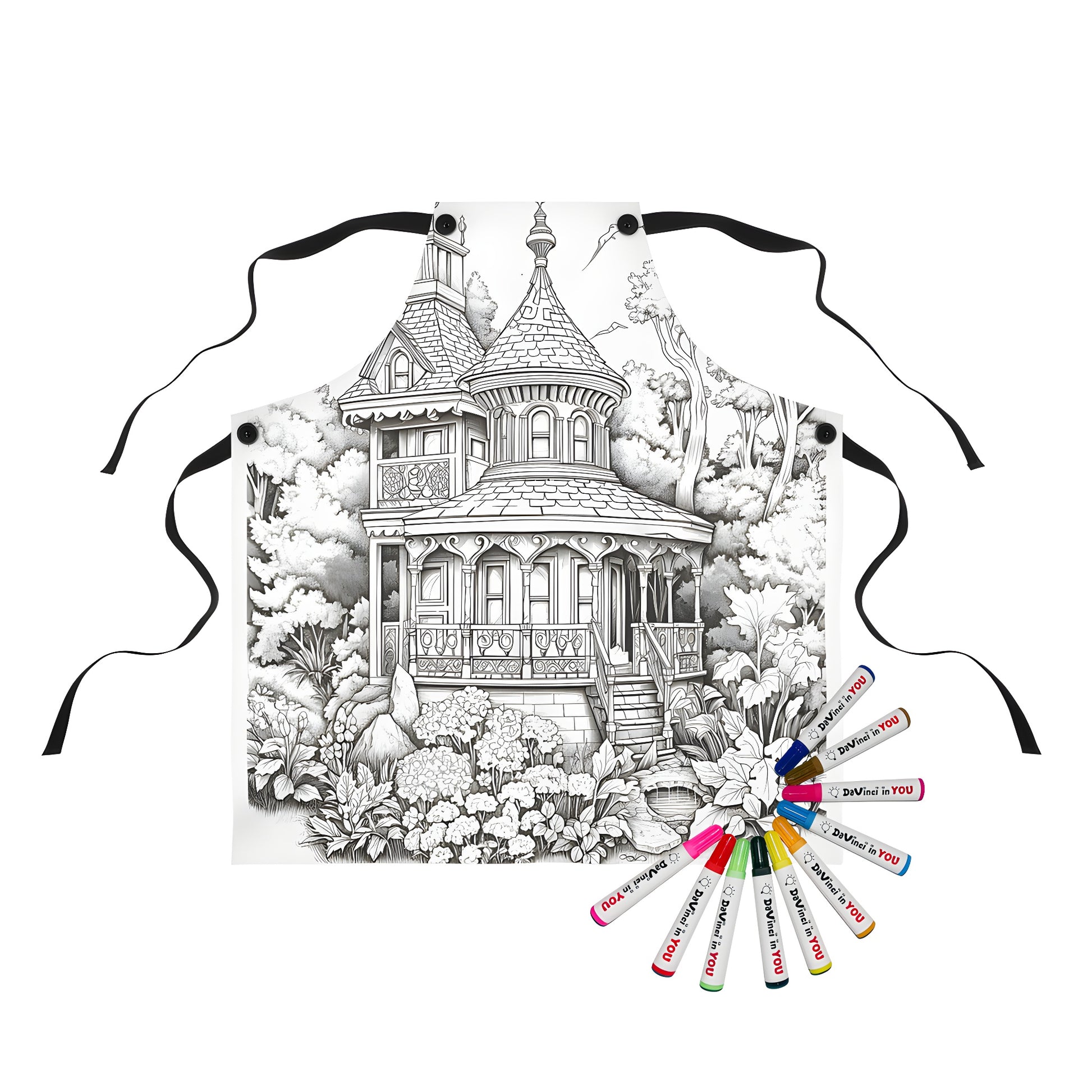 Aprons featuring intricate black and white drawings of victorian houses surrounded by nature scenes, including trees, plants, and birds in flight.