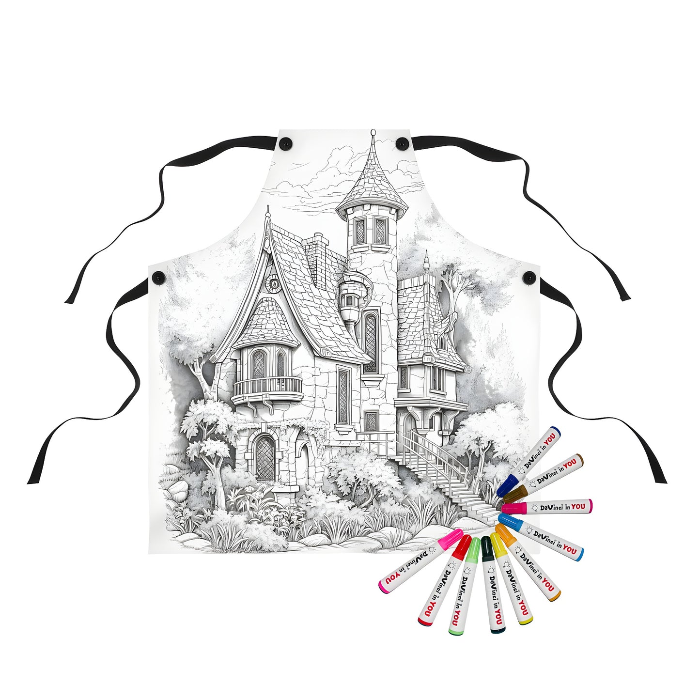 Whimsical mansion apron with detailed black and white drawing of a fantasy house design, surrounded by trees, featuring intricate architectural details.