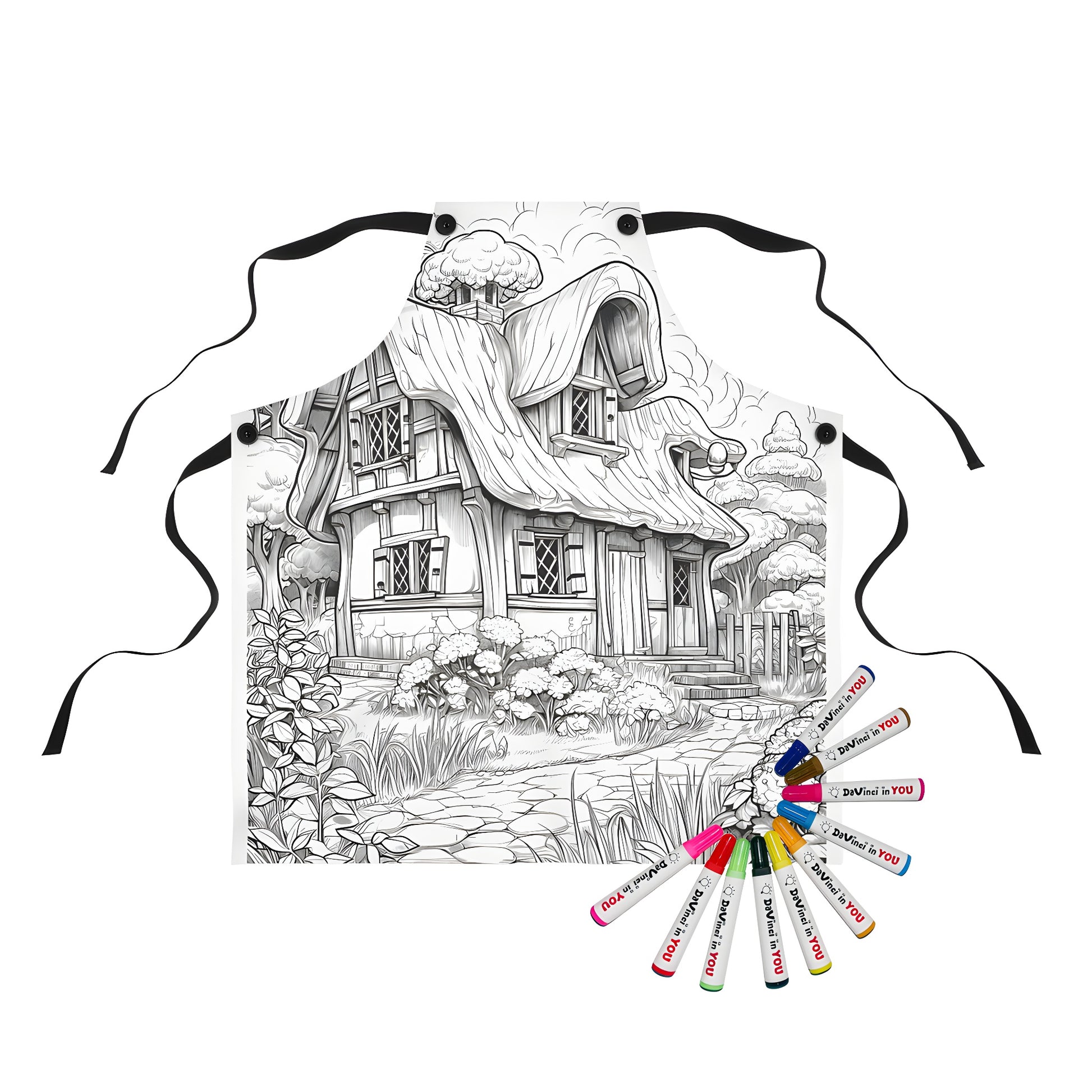 Apron with whimsical cottage scene printing, featuring a detailed fairy tale house, garden, and trees on fabric