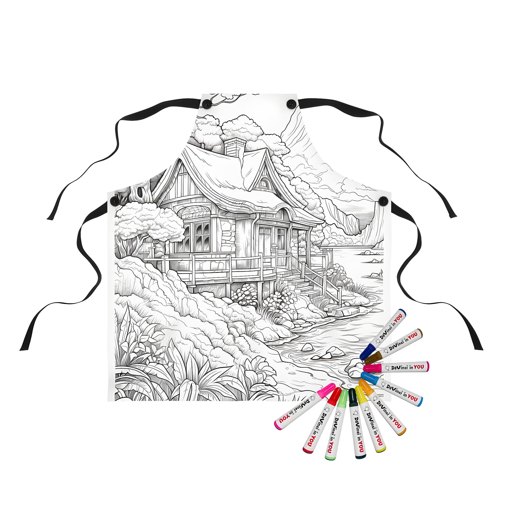 Coloring apron with nature scene of cabin by river, surrounded by trees and mountains