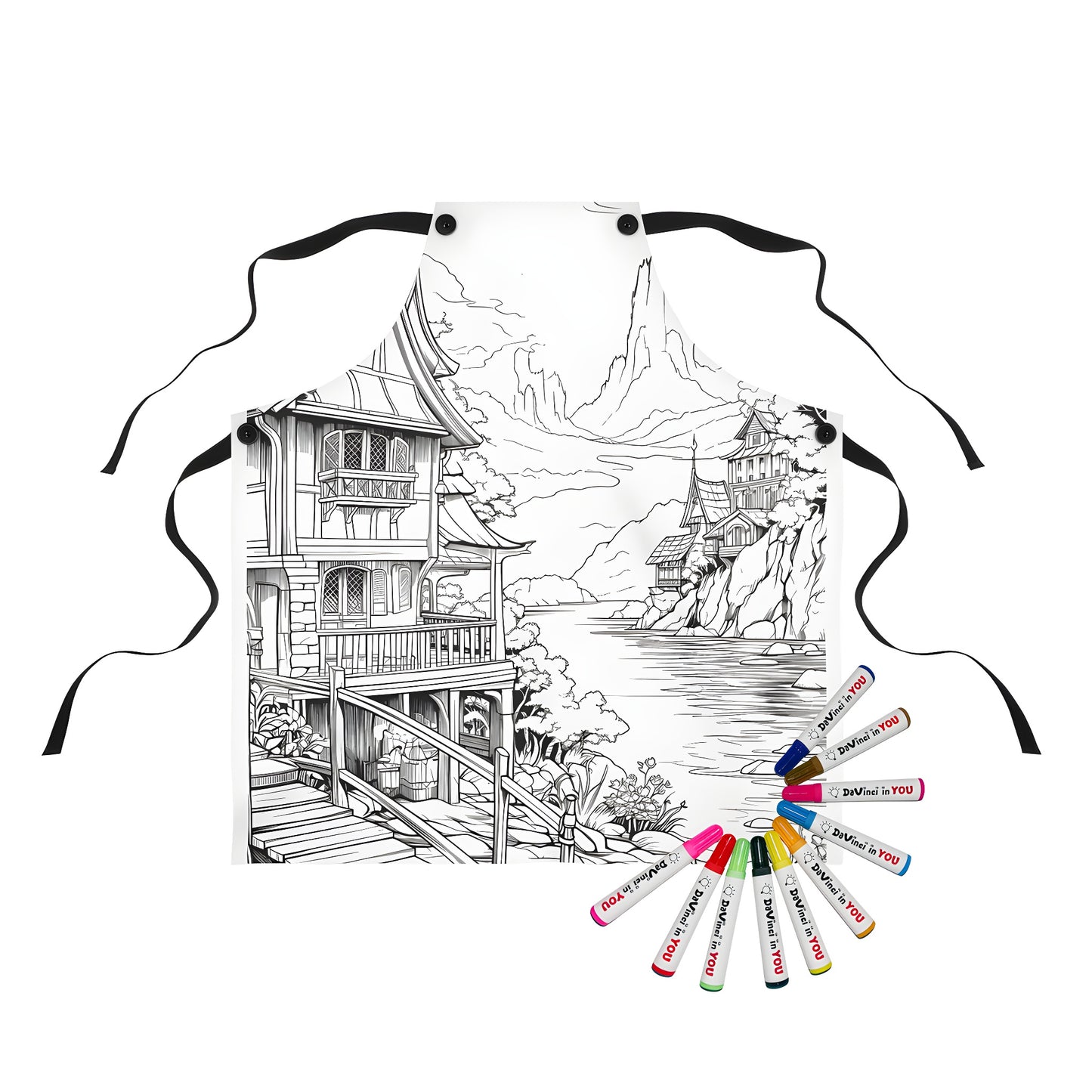 Intricate black-and-white drawing of riverside homes, wooden pathways, and mountains background on apron