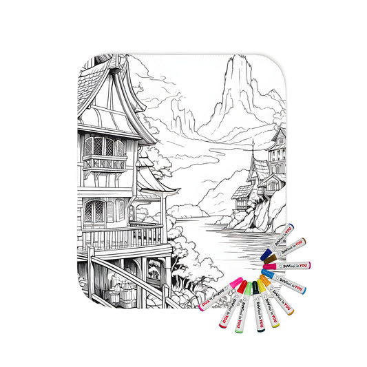 Coloring blanket featuring an intricate black-and-white drawing of riverside homes, a wooden pathway, and mountains