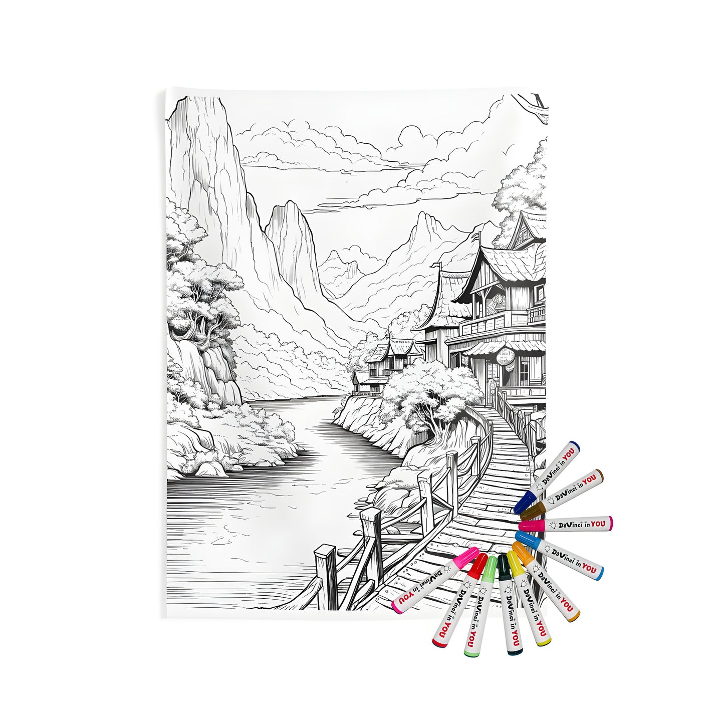 Indoor wall tapestry featuring a detailed drawing of a traditional village scene with a river, trees, wooden bridge, and scenic landscape. Includes fabric markers for creative coloring.