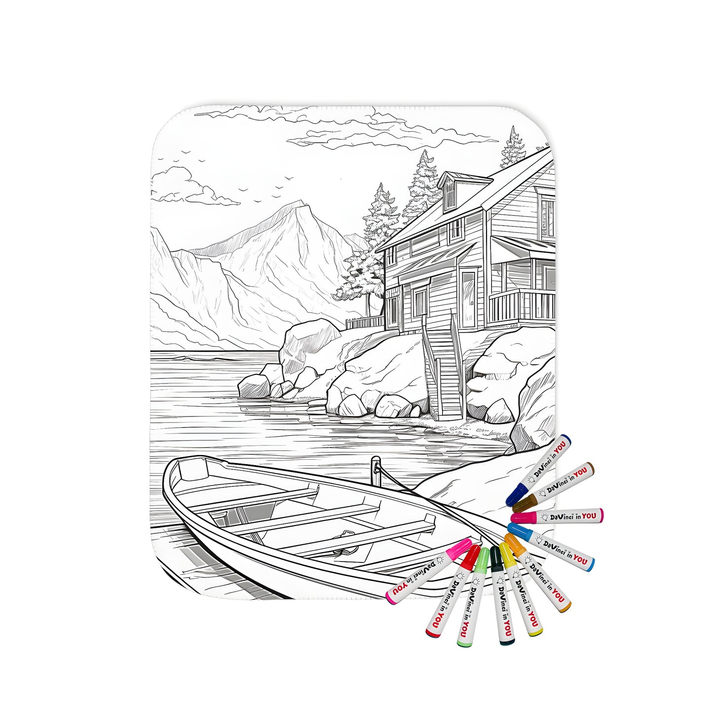 Coloring blanket of lakeside scene with house, boat, and mountains