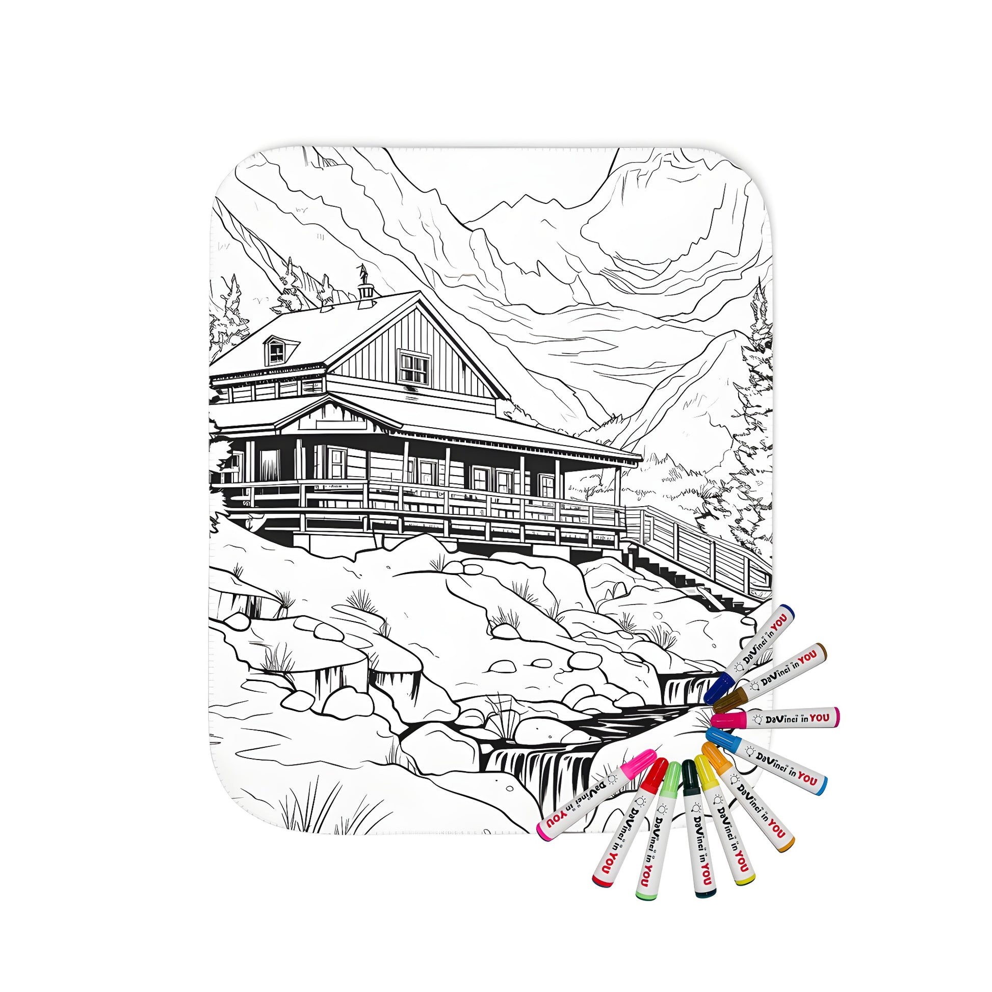 Cozy blanket with cabin illustration, featuring a serene mountain landscape with a tranquil stream and towering trees