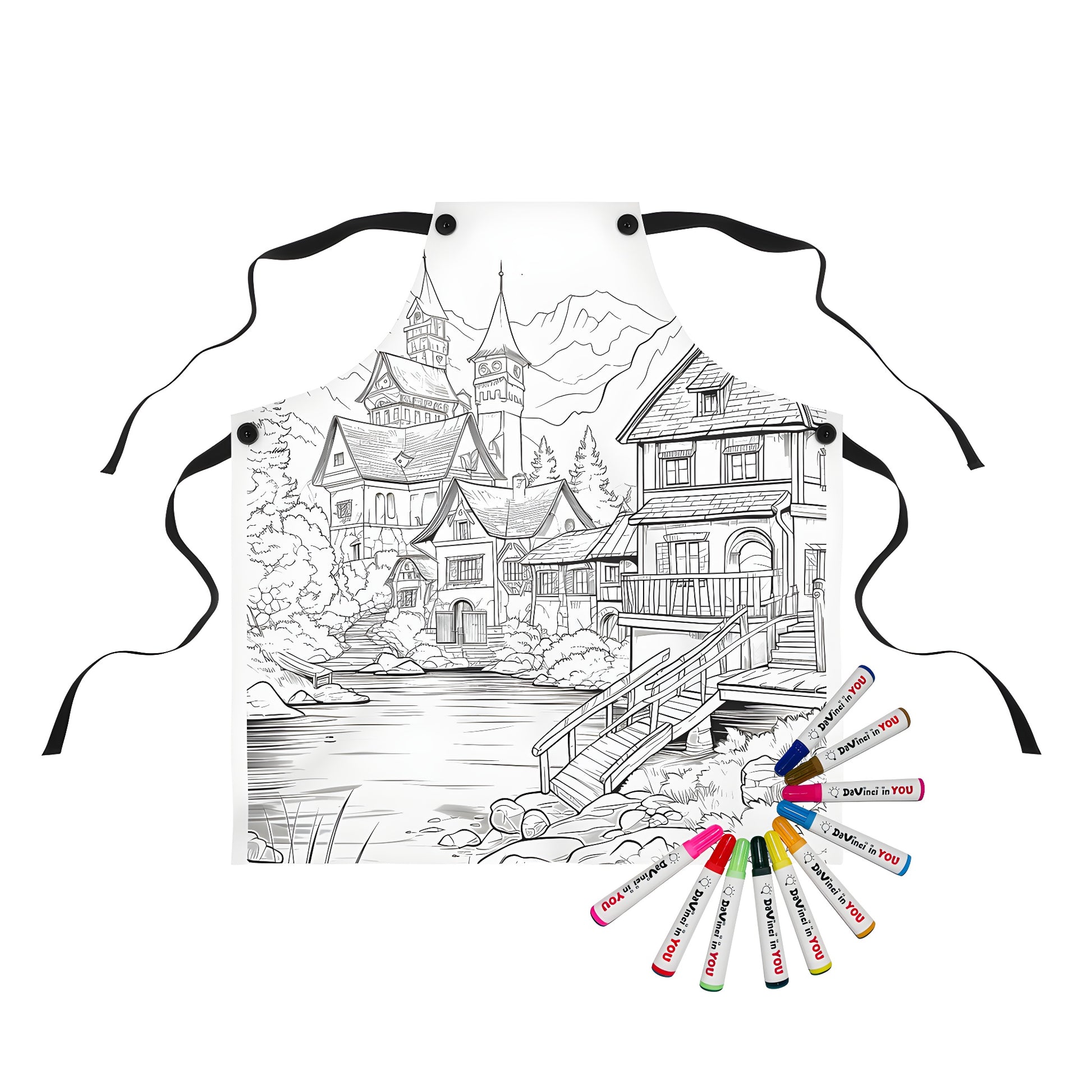 Coloring apron featuring a detailed line drawing of a serene mountain village scene with houses, cathedral, bridge over pond and natural surroundings