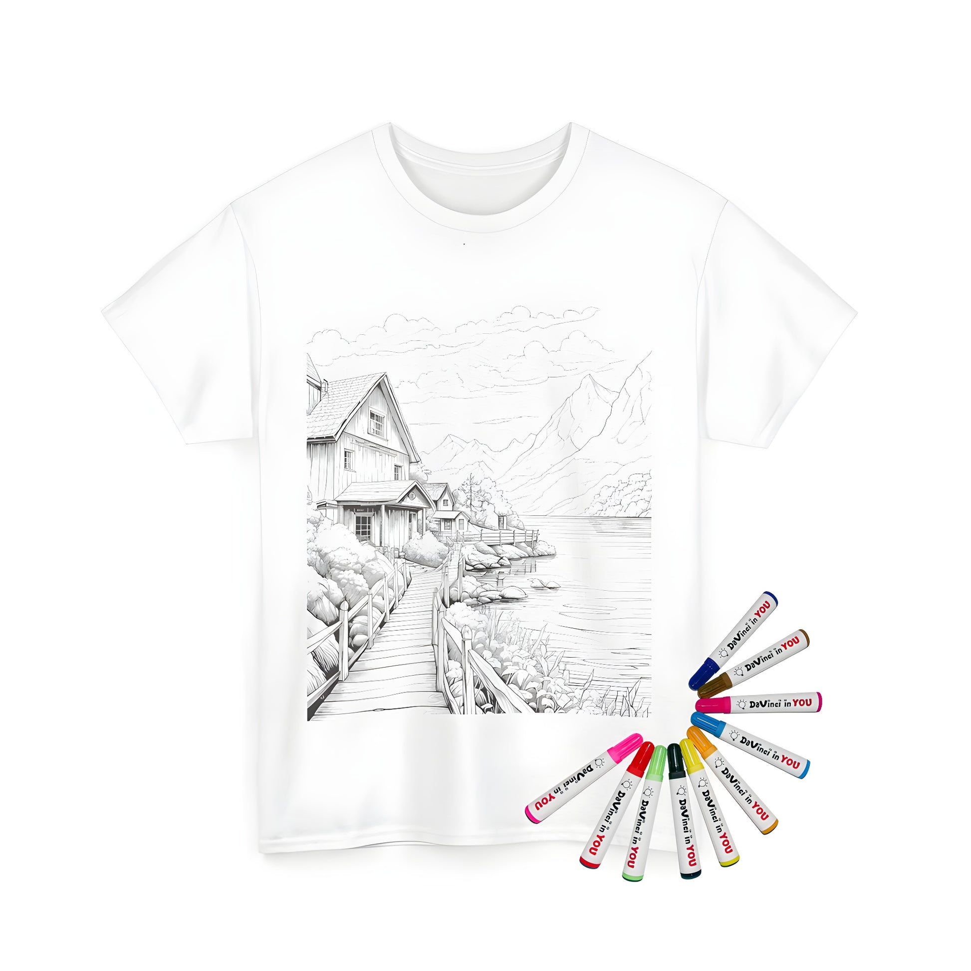 Serene countryside landscape illustration, houses by a peaceful lake, mountains backdrop, wooden path detail on a unisex t-shirt