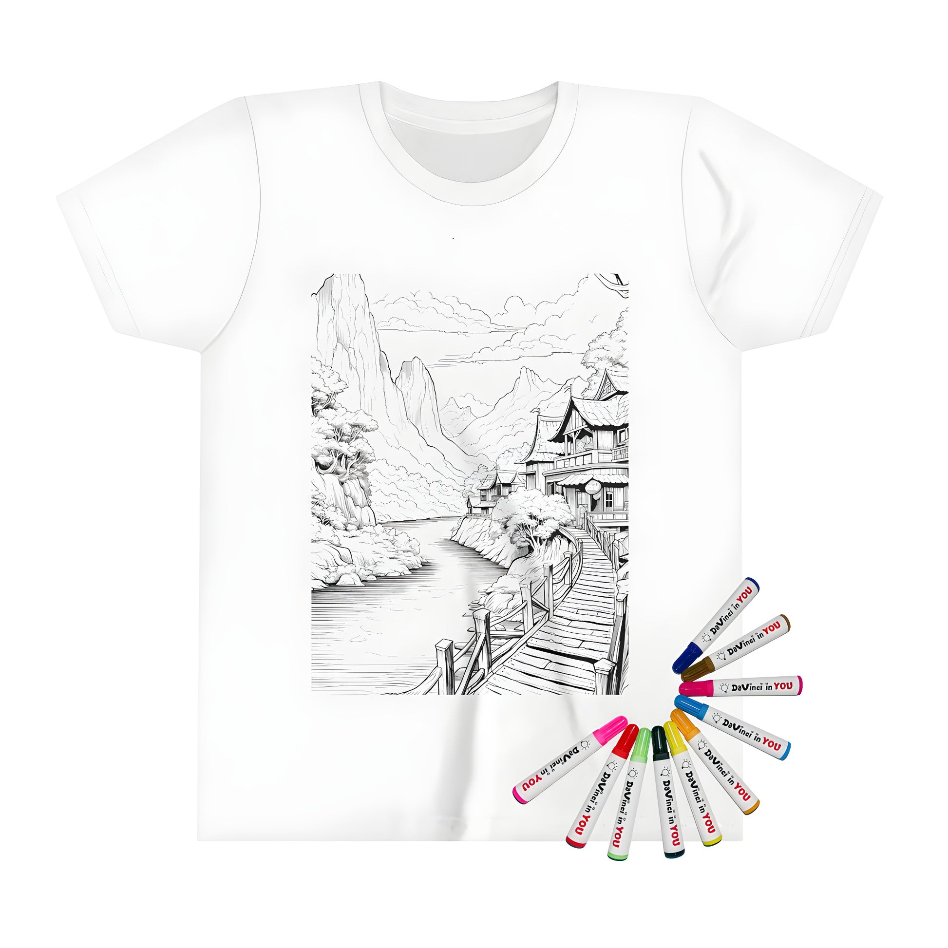 Kid's t-shirt with colorful mountain village design featuring a river, trees, wooden bridge, and scenic landscape