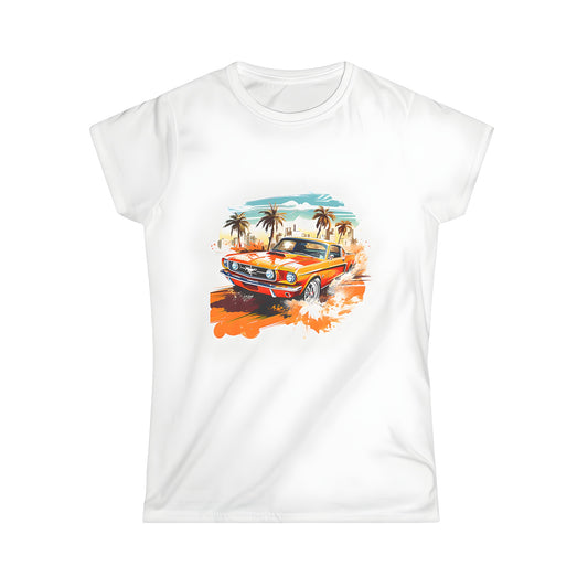 Women's graphic tee featuring an iconic American muscle car illustration, palm trees, and cityscape backdrop