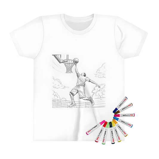 A fun kid's t-shirt featuring a coloring page design of a person jumping to dunk on an outdoor basketball court with trees in the background.