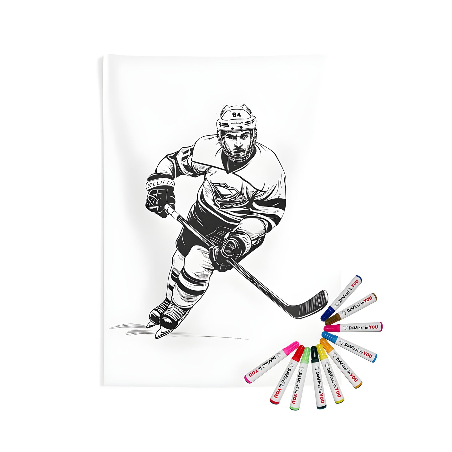 Coloring kit for indoor wall tapestries featuring a black and white drawing of a hockey player in full gear skating with a stick