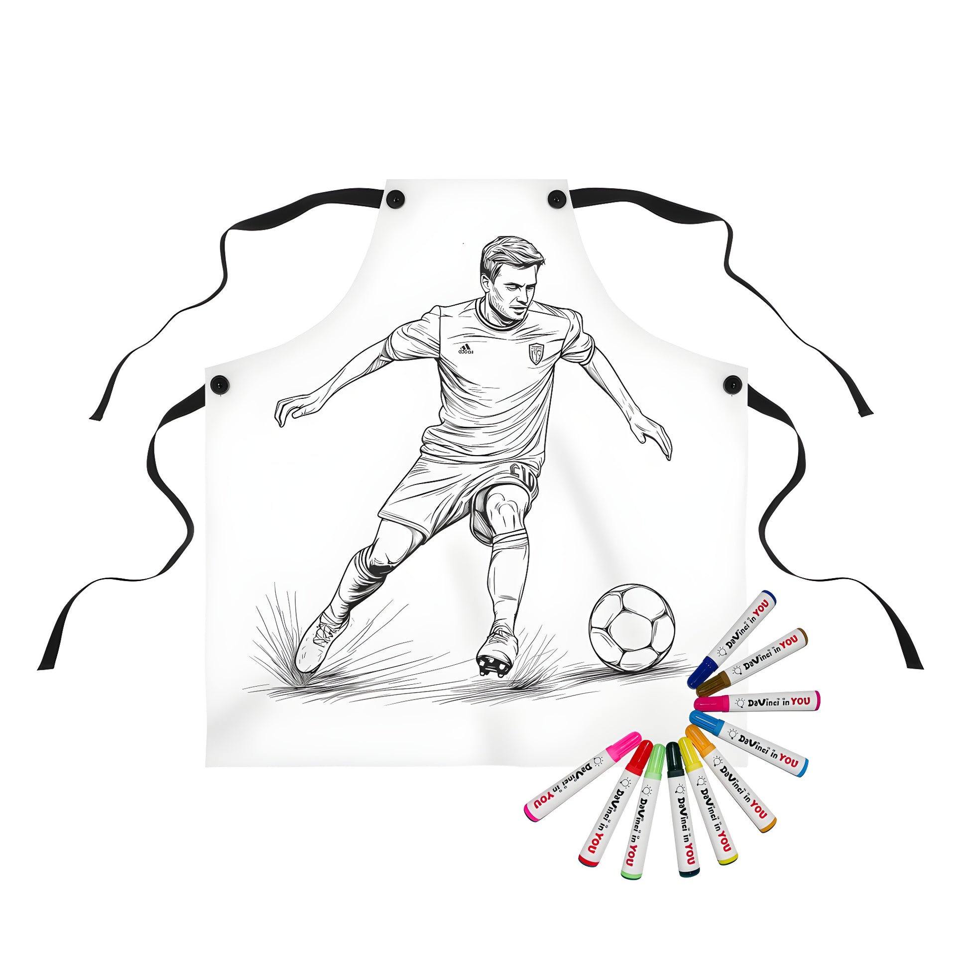 Coloring apron for kids featuring a black and white illustration of a soccer player in action kicking a soccer ball