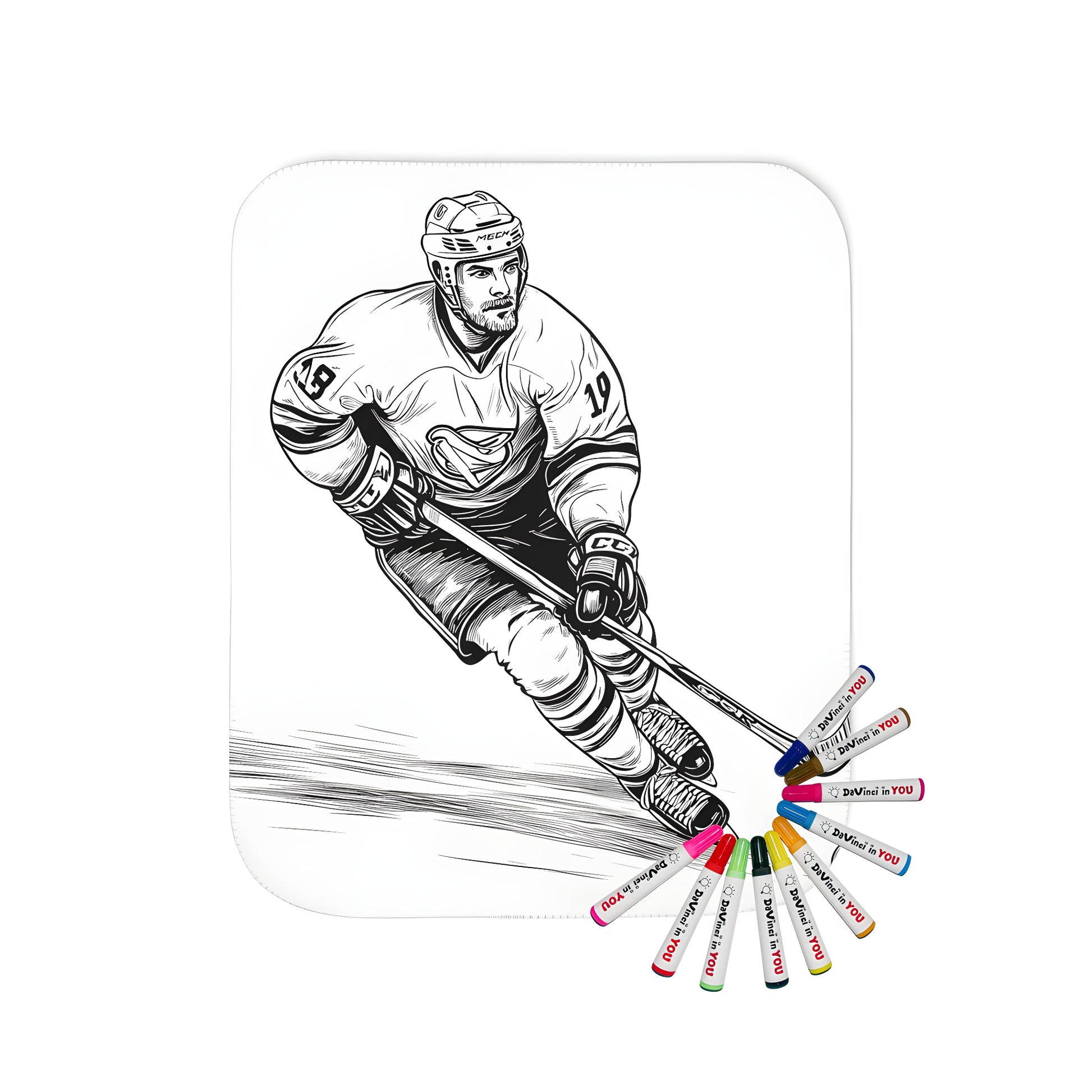 Blanket coloring kit with fabric markers featuring an action-packed illustration of a hockey player in motion, skating with stick and puck