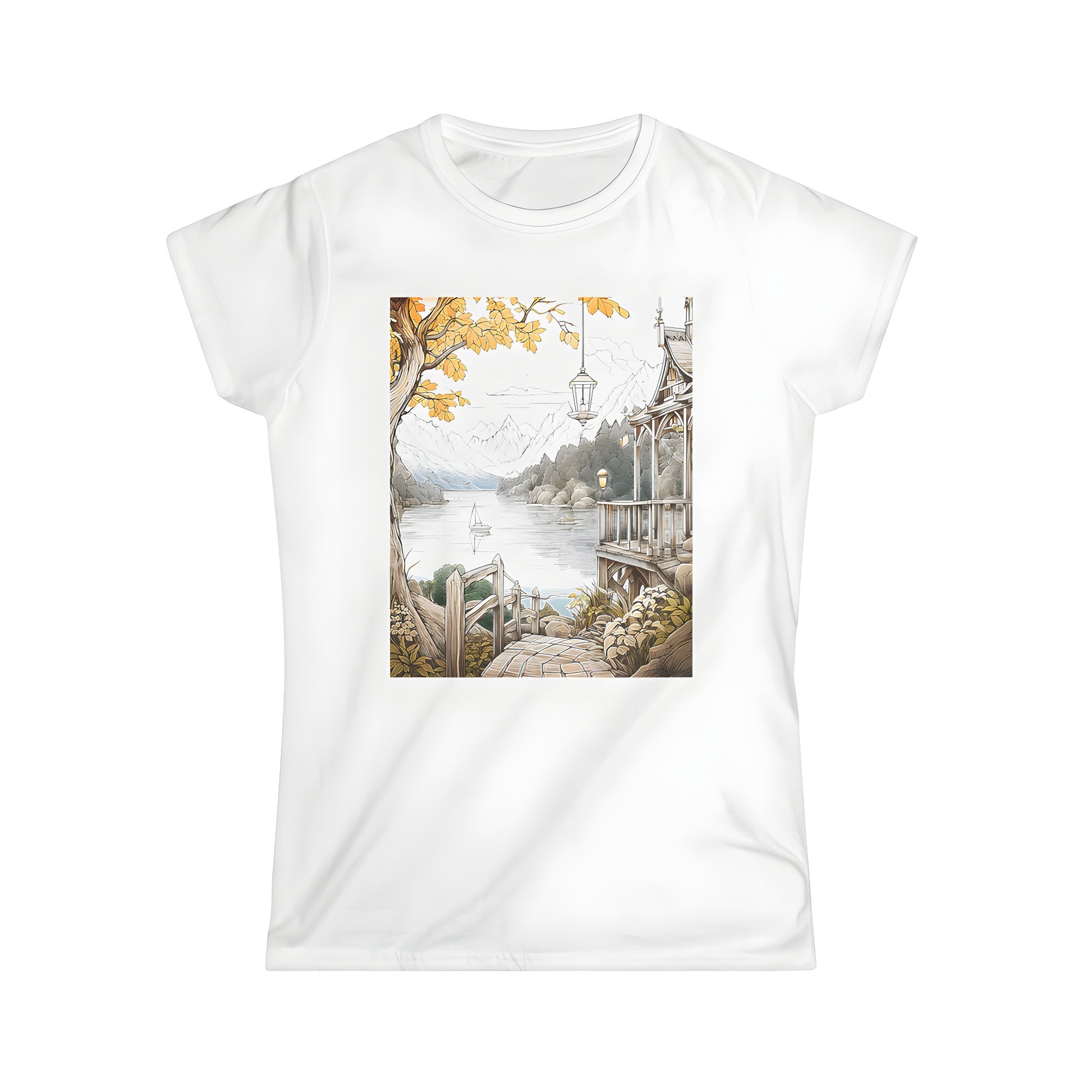 Colorful women's t-shirt featuring a serene lake landscape with sailboat and cabin