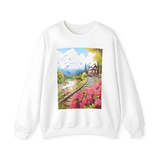 Adult Sweatshirt featuring serene mountain landscape design with railroad tracks, wooden cabin, pink flowers, pine trees, and flowing river