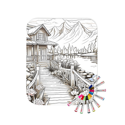 Cozy blanket featuring a serene mountain scene with a lake, cabin, flowers, and majestic peaks